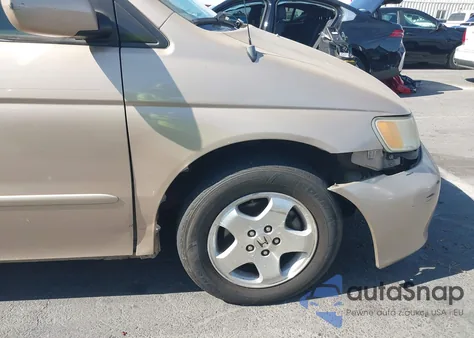 2001 Honda Odyssey Ex z USA, uszkodzony, nr VIN 2HKRL18661H572031